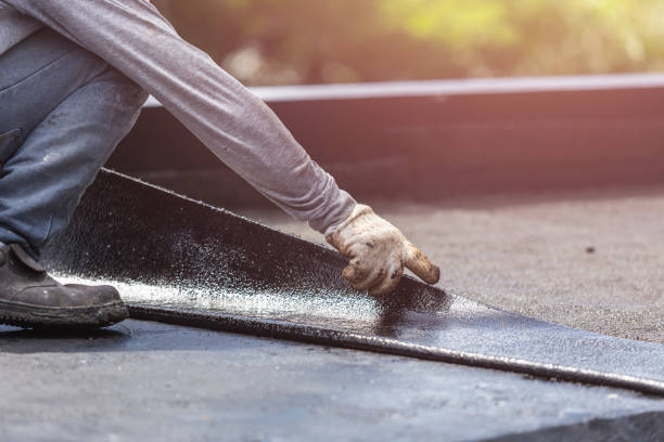 Professional Waterproofing technician working in Gobles, MI